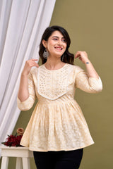 Cream-coloured regular peplum top