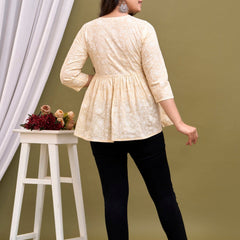 Cream-coloured regular peplum top