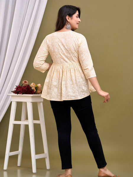 Cream-coloured regular peplum top