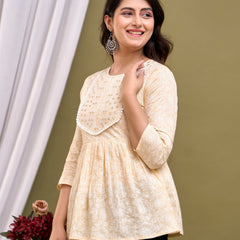 Cream-coloured regular peplum top