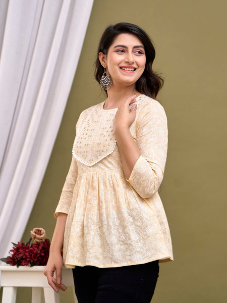 Cream-coloured regular peplum top