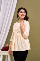 Cream-coloured regular peplum top
