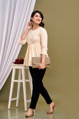 Cream-coloured regular peplum top